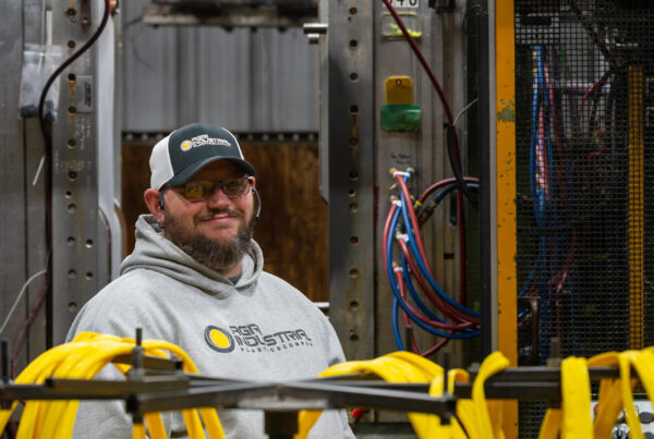 Engineer working at Agri-Industrial Plastics.